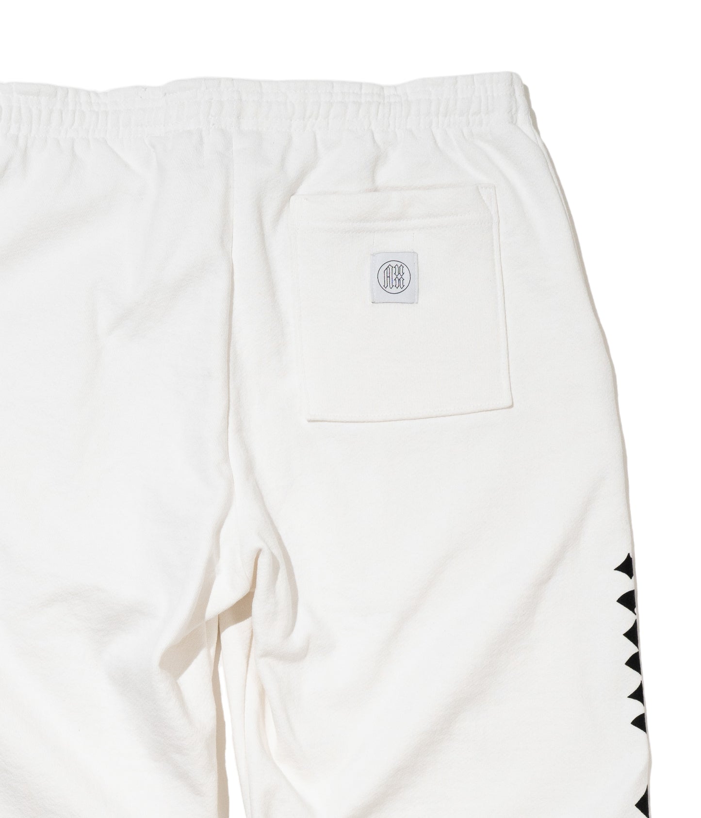 AUN・TERRA. IN LINE SANSKRIT SWEAT PANTS WHITE