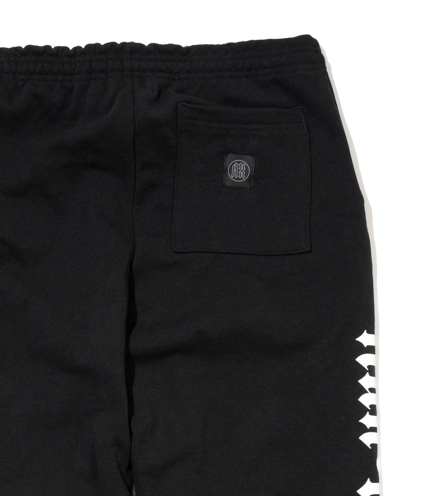 AUN・TERRA. IN LINE SANSKRIT SWEAT PANTS BLACK